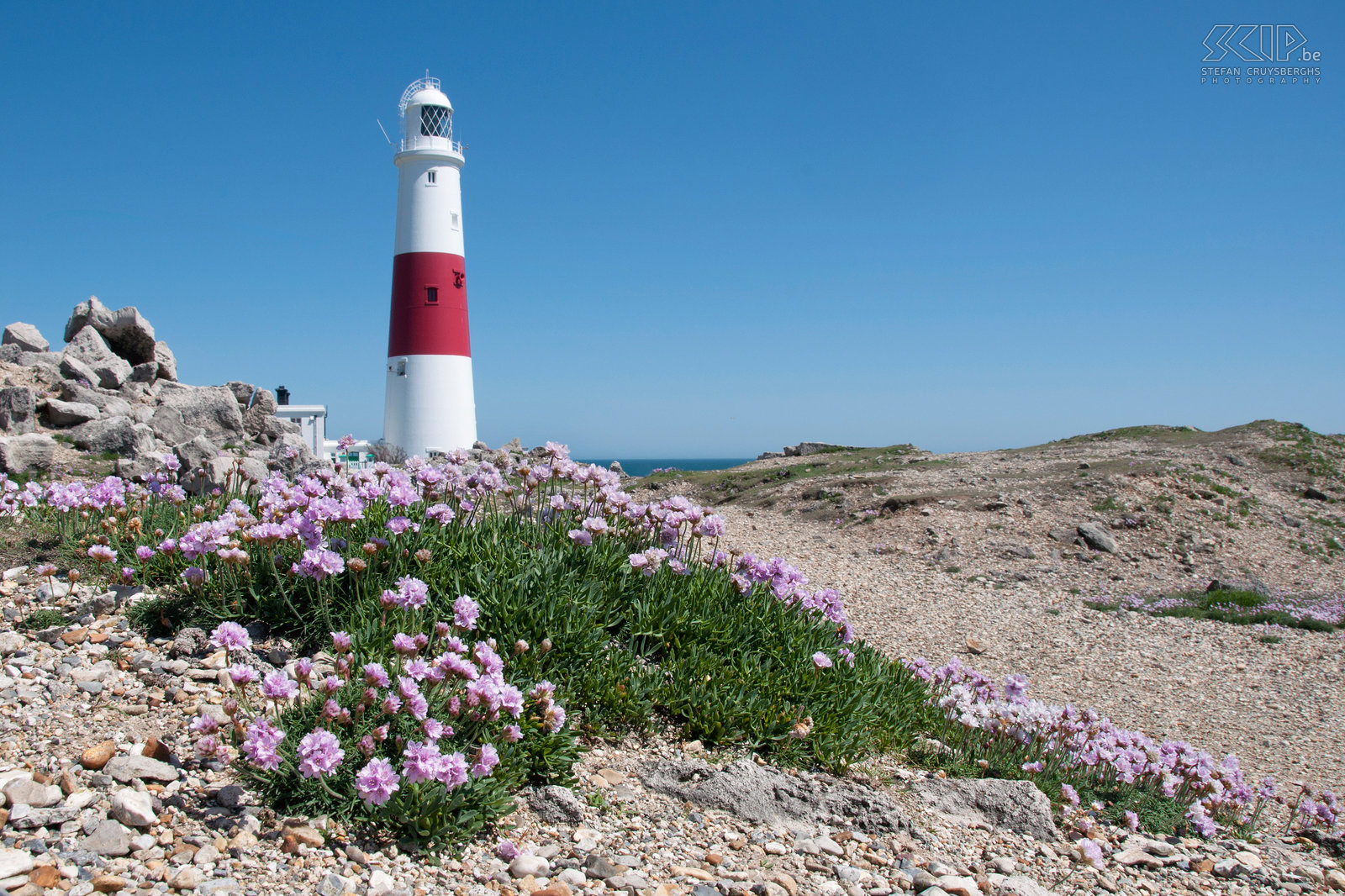 Portland Bill Lighthouse The beautiful white and red striped Portland Bill lighthouse in the Isle of Portland in southern Dorset. It was built in 1906. Stefan Cruysberghs